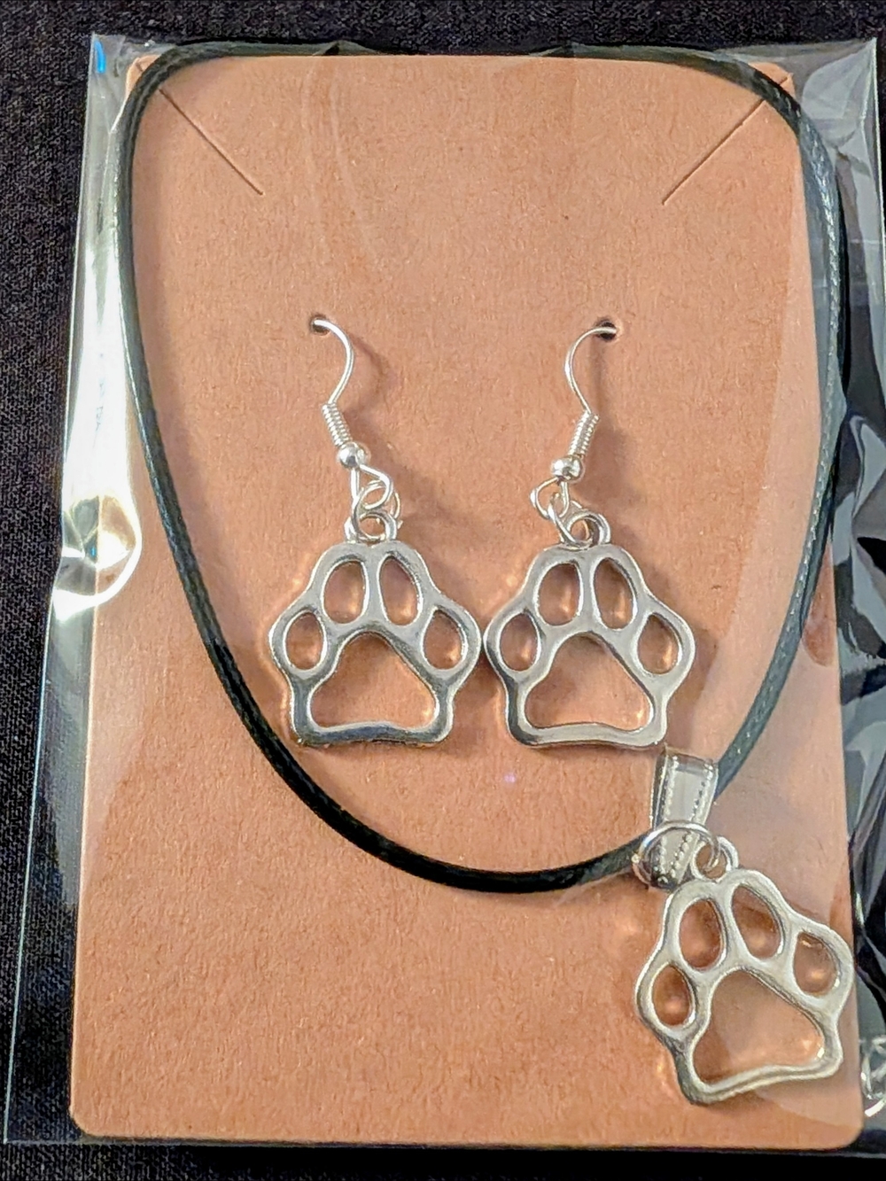 Hand Crafted Silver Paw Print Earrings with Black Cord Accent